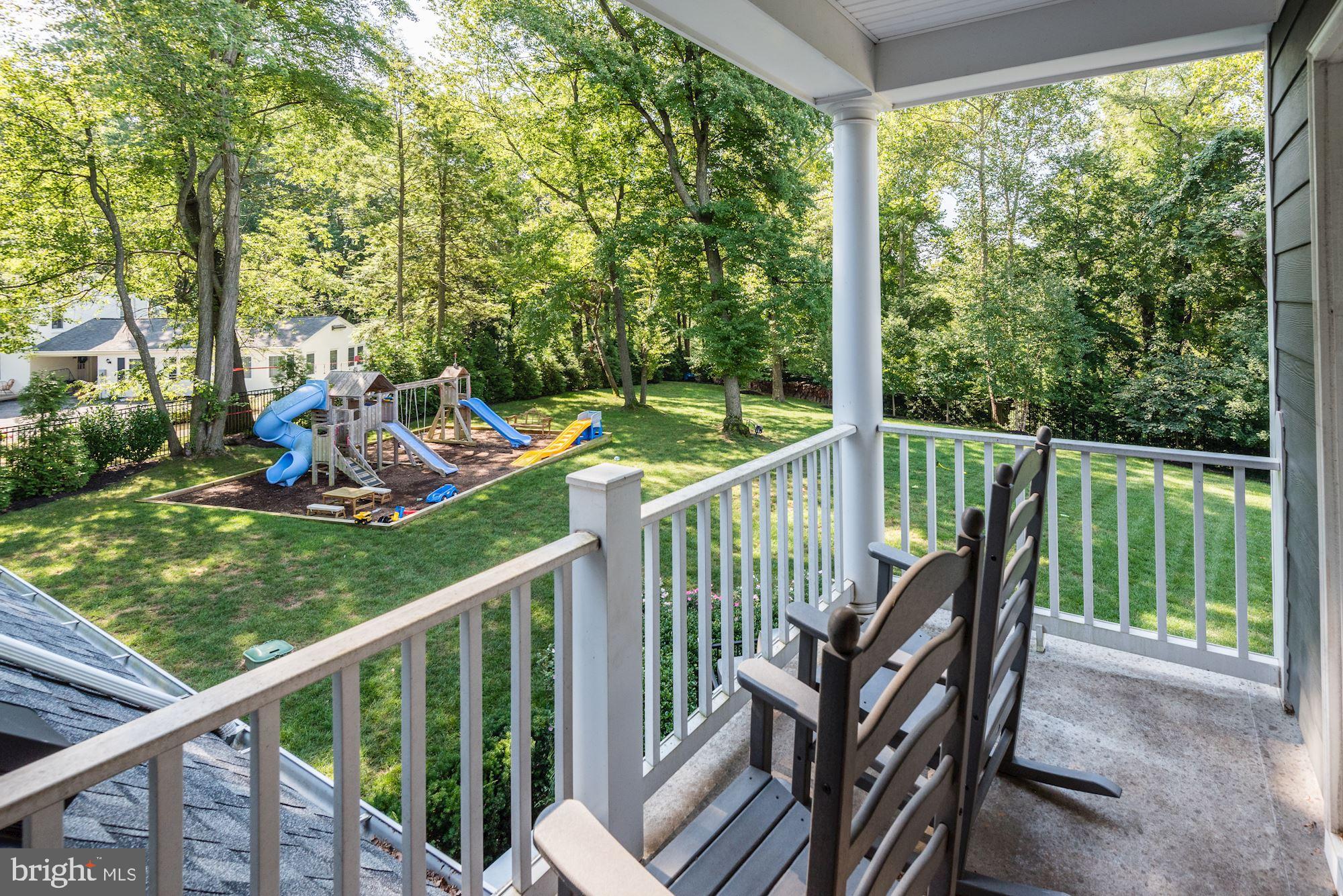 11645 Pine Tree Drive Fairfax, VA 22033 - Photo 19 of 48 a view of a wooden deck and a backyard