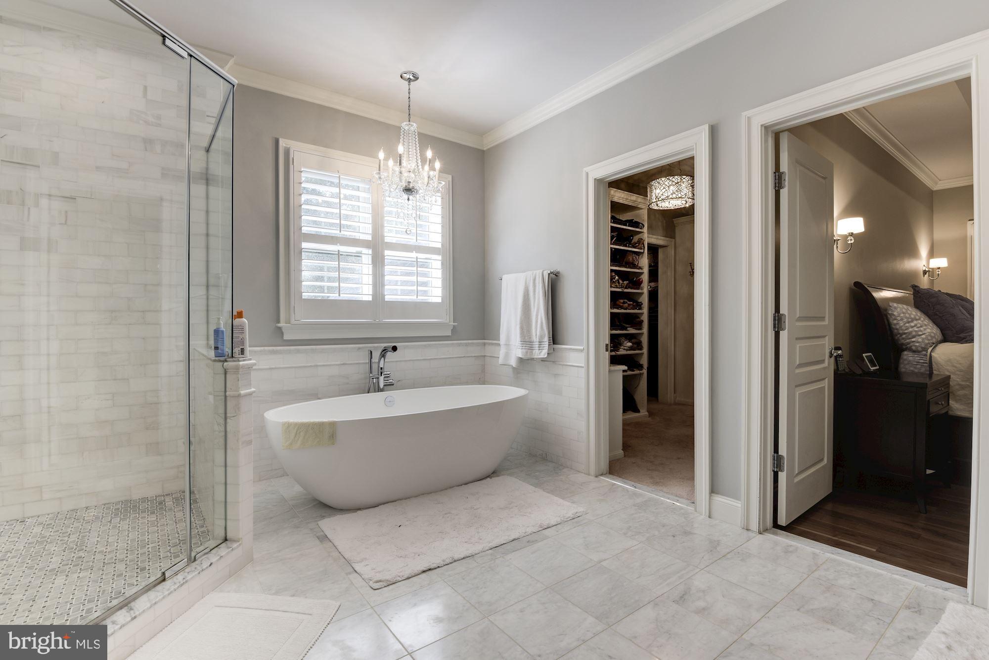 11645 Pine Tree Drive Fairfax, VA 22033 - Photo 20 of 48 a bathroom with a bathtub and a shower