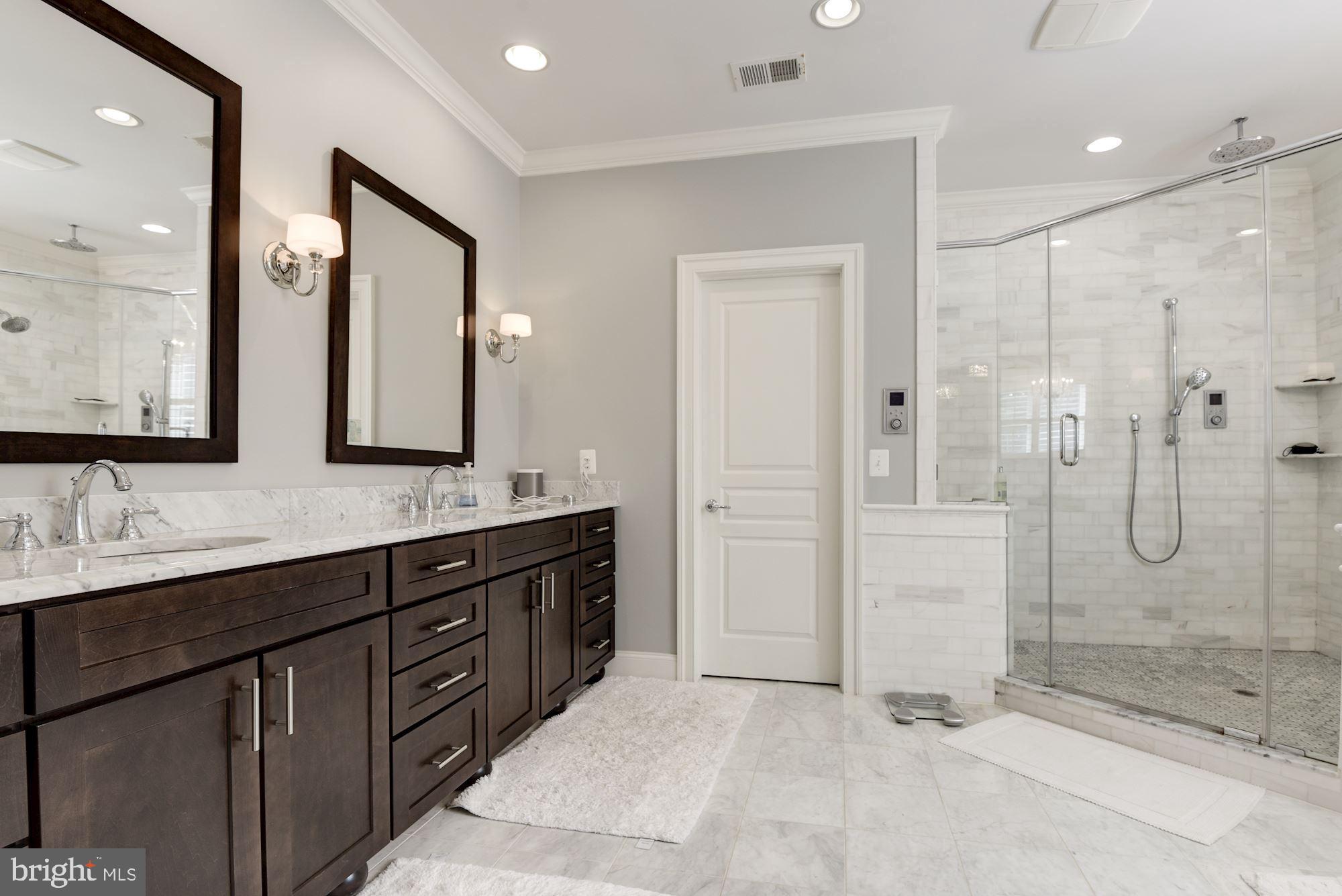 11645 Pine Tree Drive Fairfax, VA 22033 - Photo 21 of 48 a bathroom with a double vanity sink mirror double and shower