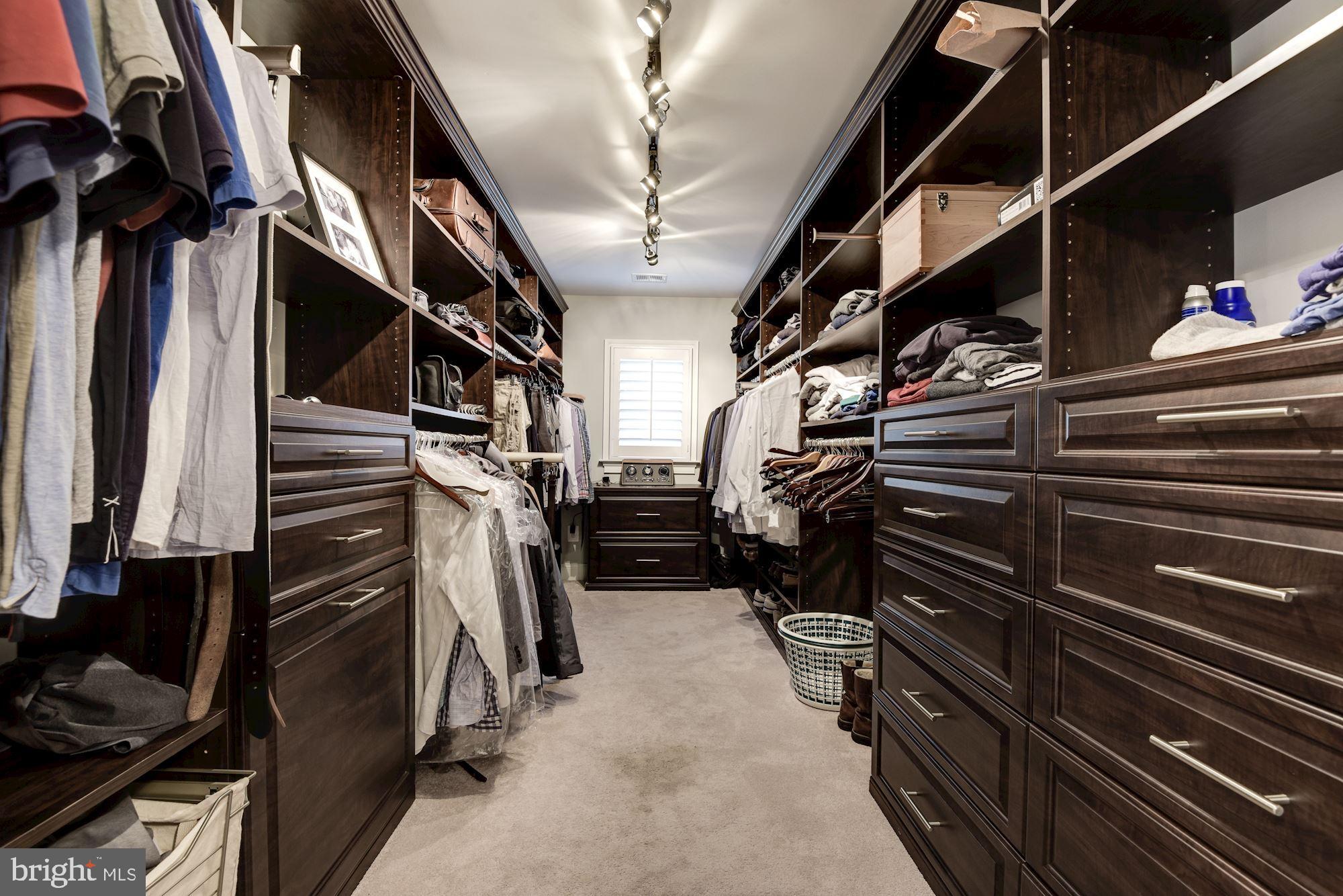 11645 Pine Tree Drive Fairfax, VA 22033 - Photo 23 of 48 a view of walk in closet with clothes and shoes