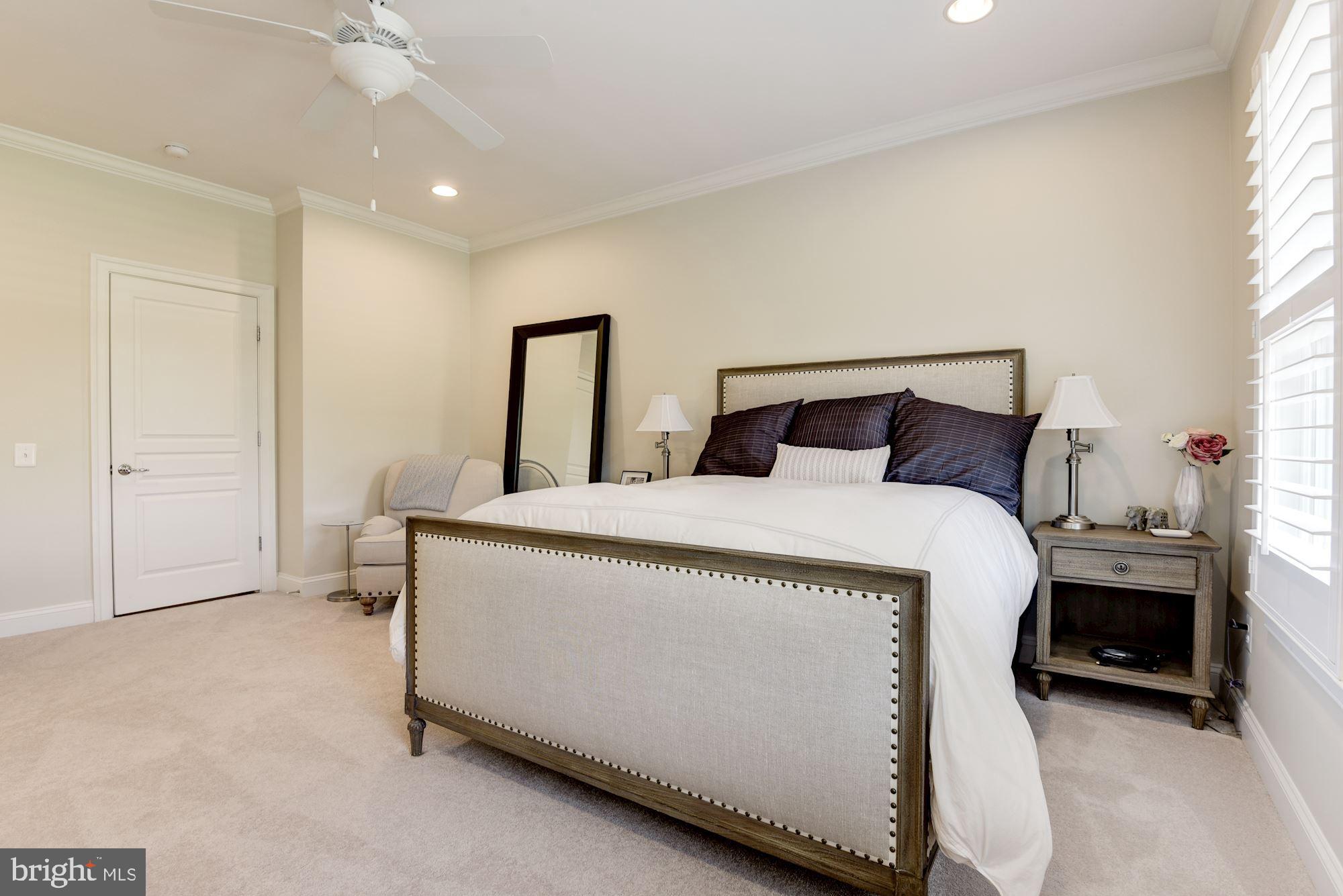 11645 Pine Tree Drive Fairfax, VA 22033 - Photo 24 of 48 a bedroom with a bed and a night stand