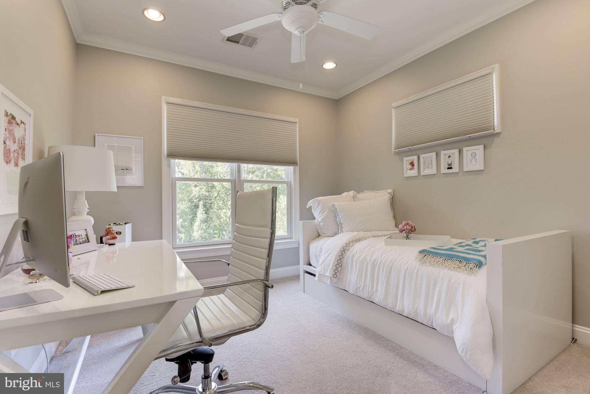 11645 Pine Tree Drive Fairfax, VA 22033 - Photo 27 of 48 a bedroom with a bed and a large window