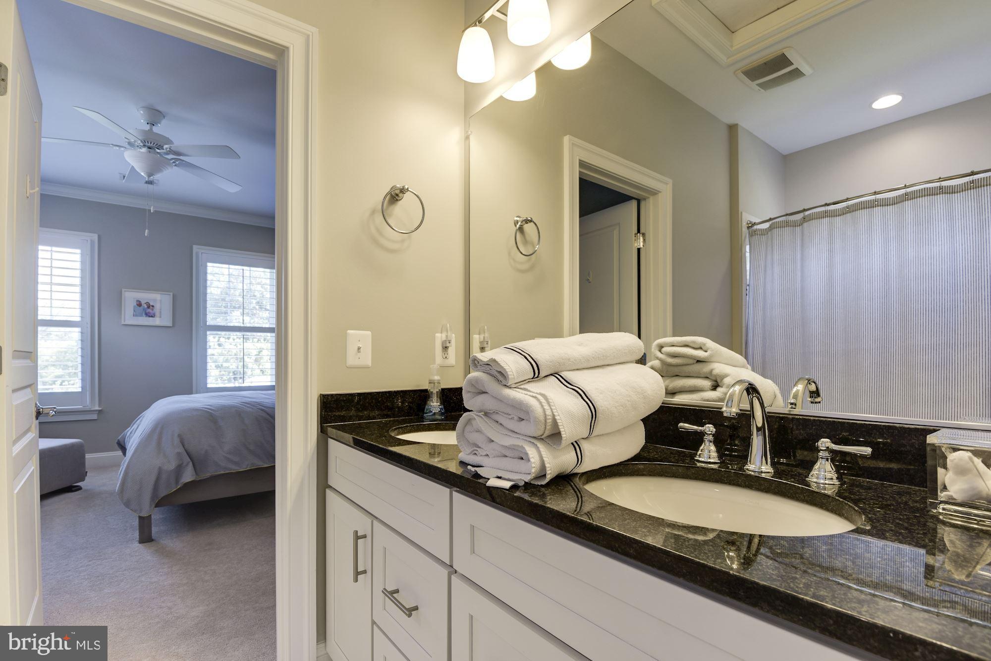 11645 Pine Tree Drive Fairfax, VA 22033 - Photo 29 of 48 a bedroom with a bed and a dresser