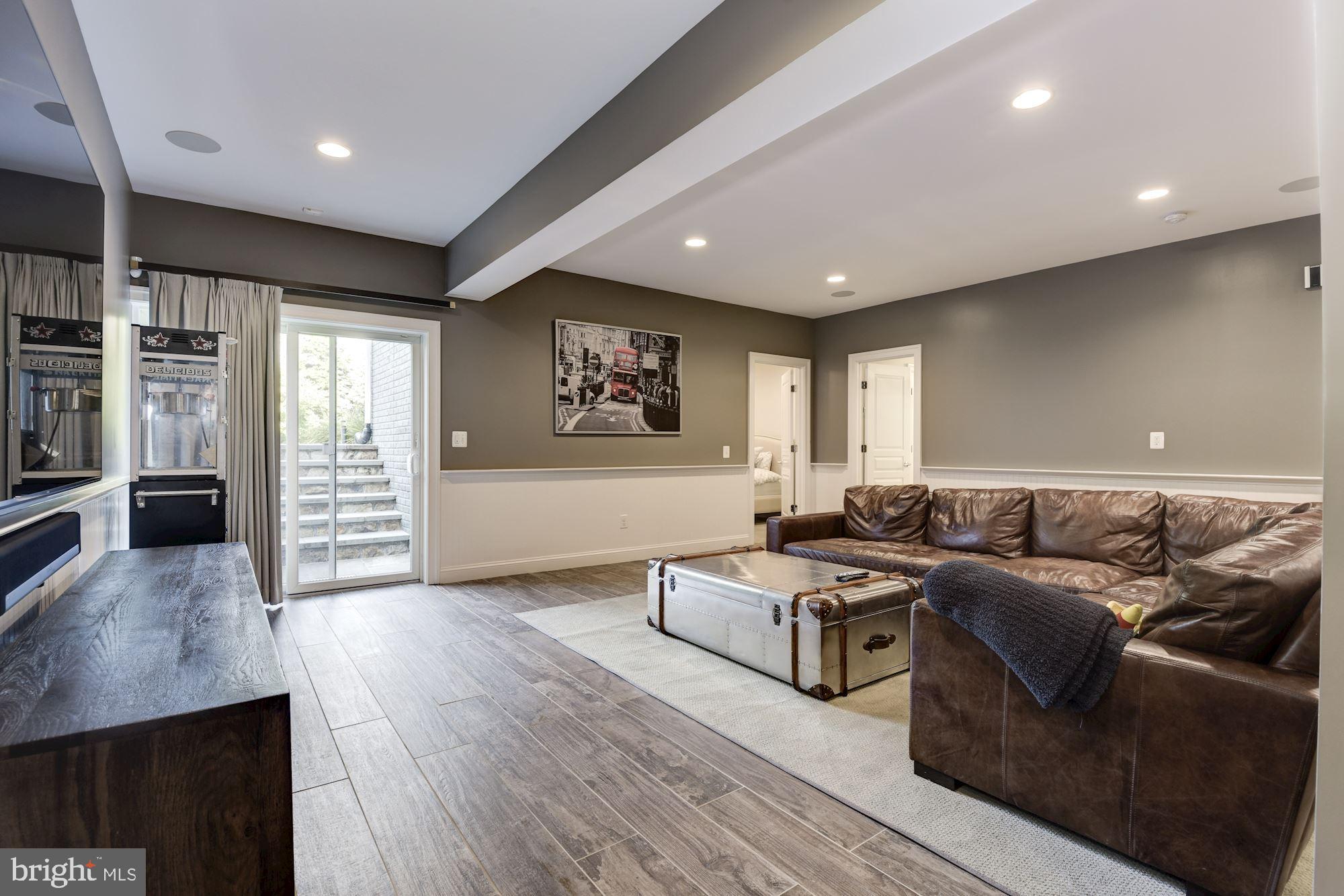 11645 Pine Tree Drive Fairfax, VA 22033 - Photo 31 of 48 a living room with furniture and a flat screen tv