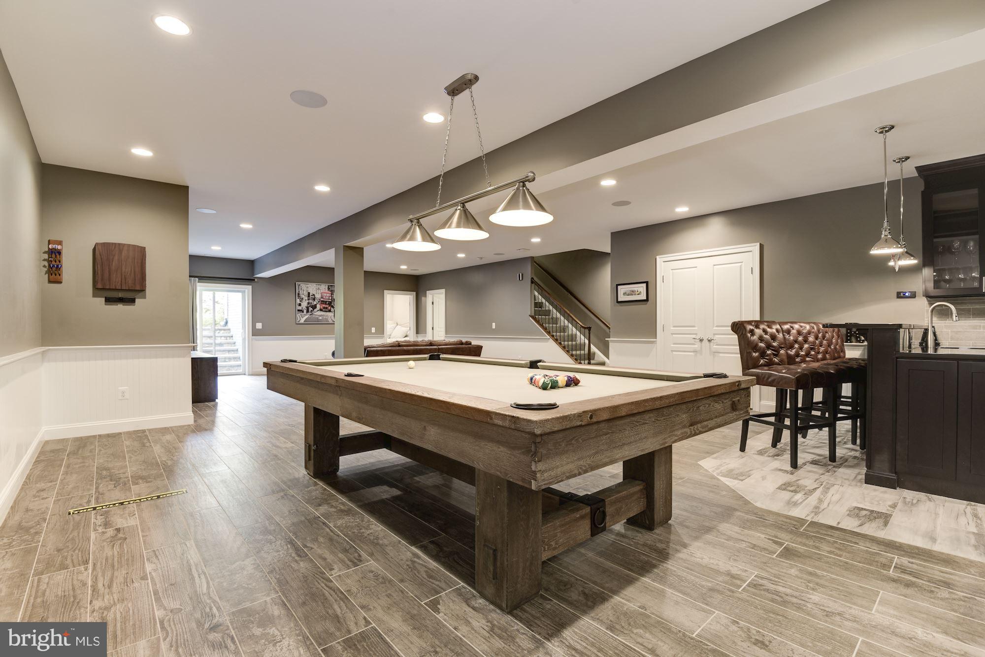 11645 Pine Tree Drive Fairfax, VA 22033 - Photo 32 of 48 a large kitchen with a table and chairs