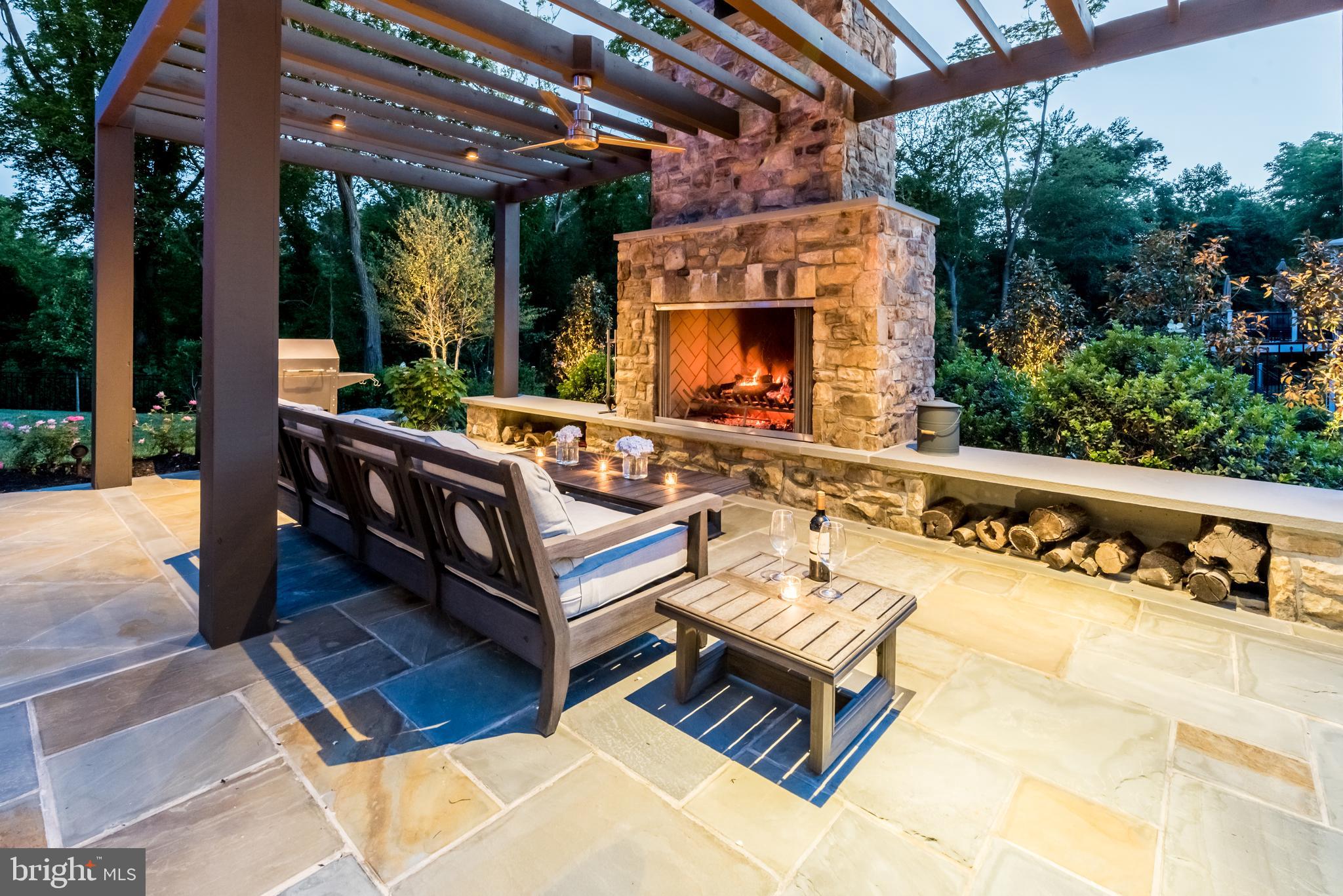 11645 Pine Tree Drive Fairfax, VA 22033 - Photo 38 of 48 a outdoor living space with furniture and a fireplace