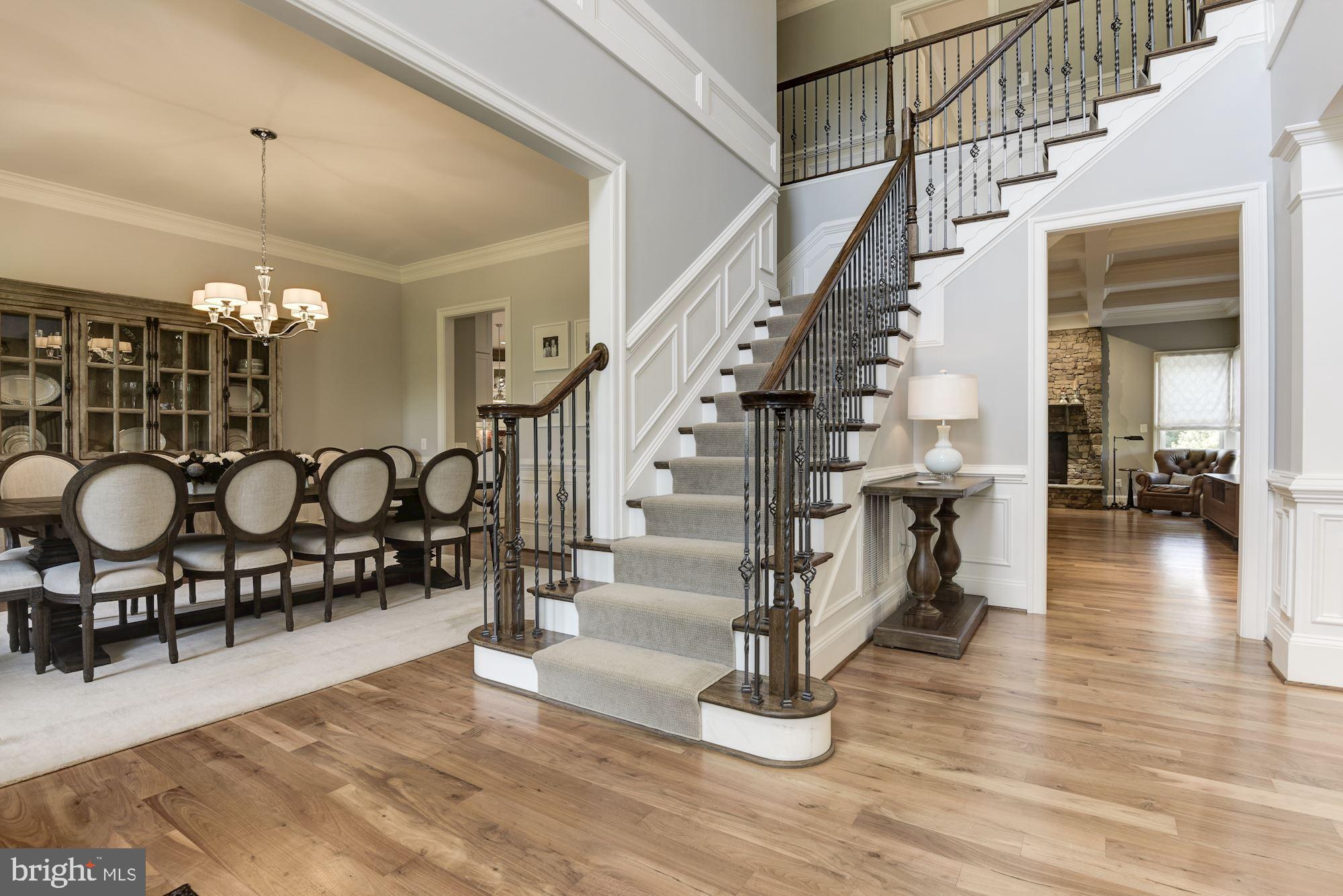 11645 Pine Tree Drive Fairfax, VA 22033 - Photo 5 of 48 a view of a livingroom with furniture stairs and a chandelier