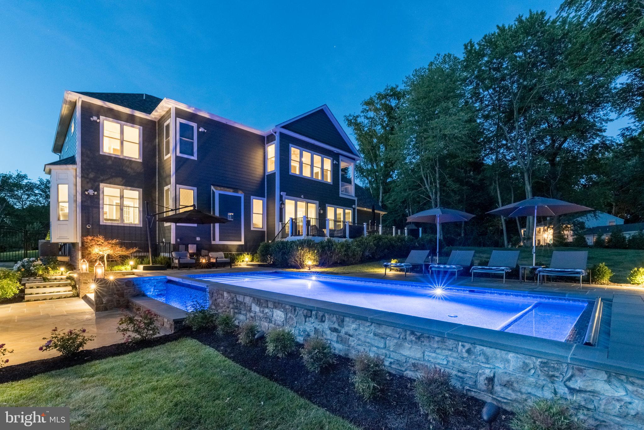 11645 Pine Tree Drive Fairfax, VA 22033 - Photo 44 of 48 a view of a house with a yard patio and swimming pool