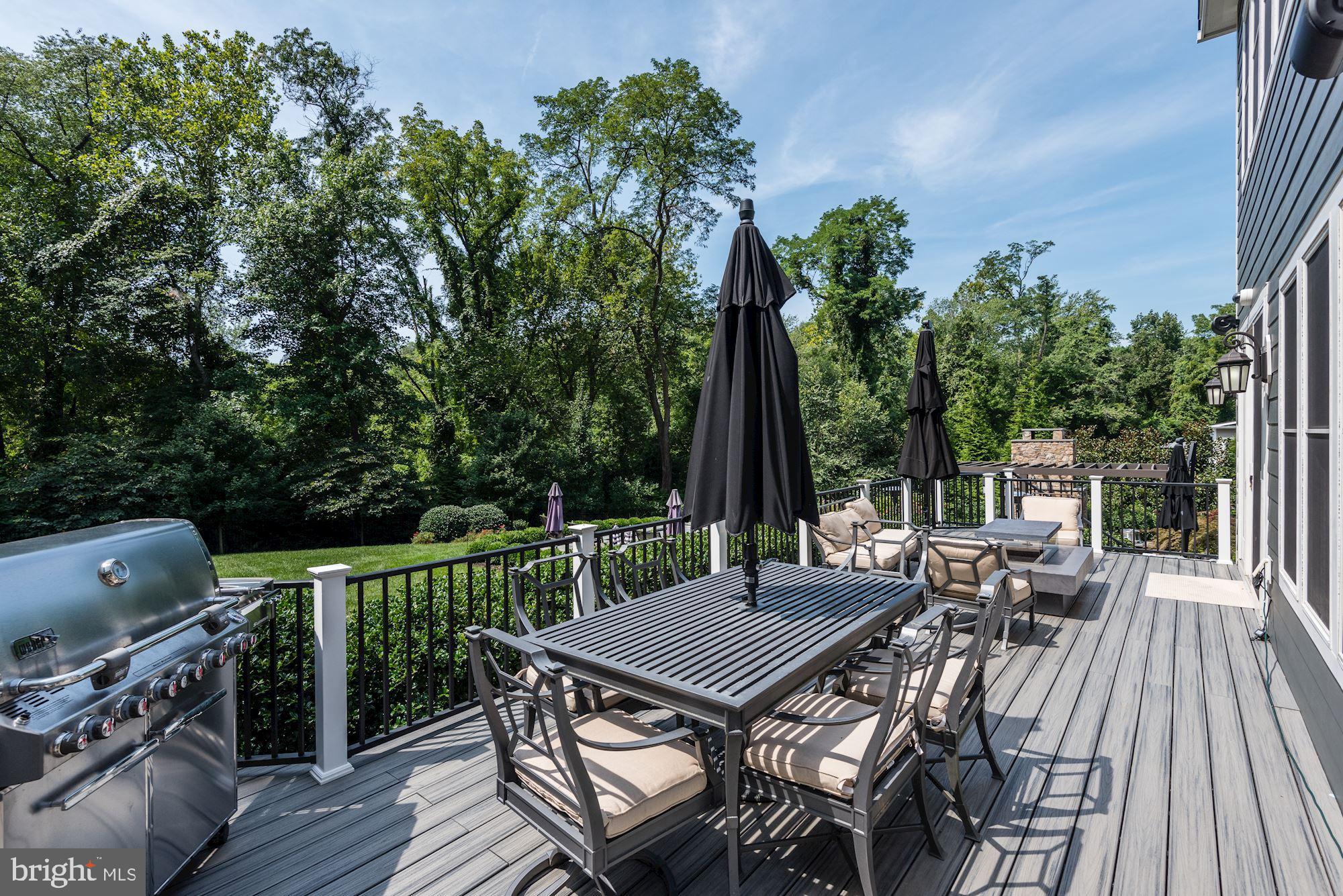 11645 Pine Tree Drive Fairfax, VA 22033 - Photo 45 of 48 a view of deck with furniture and trees