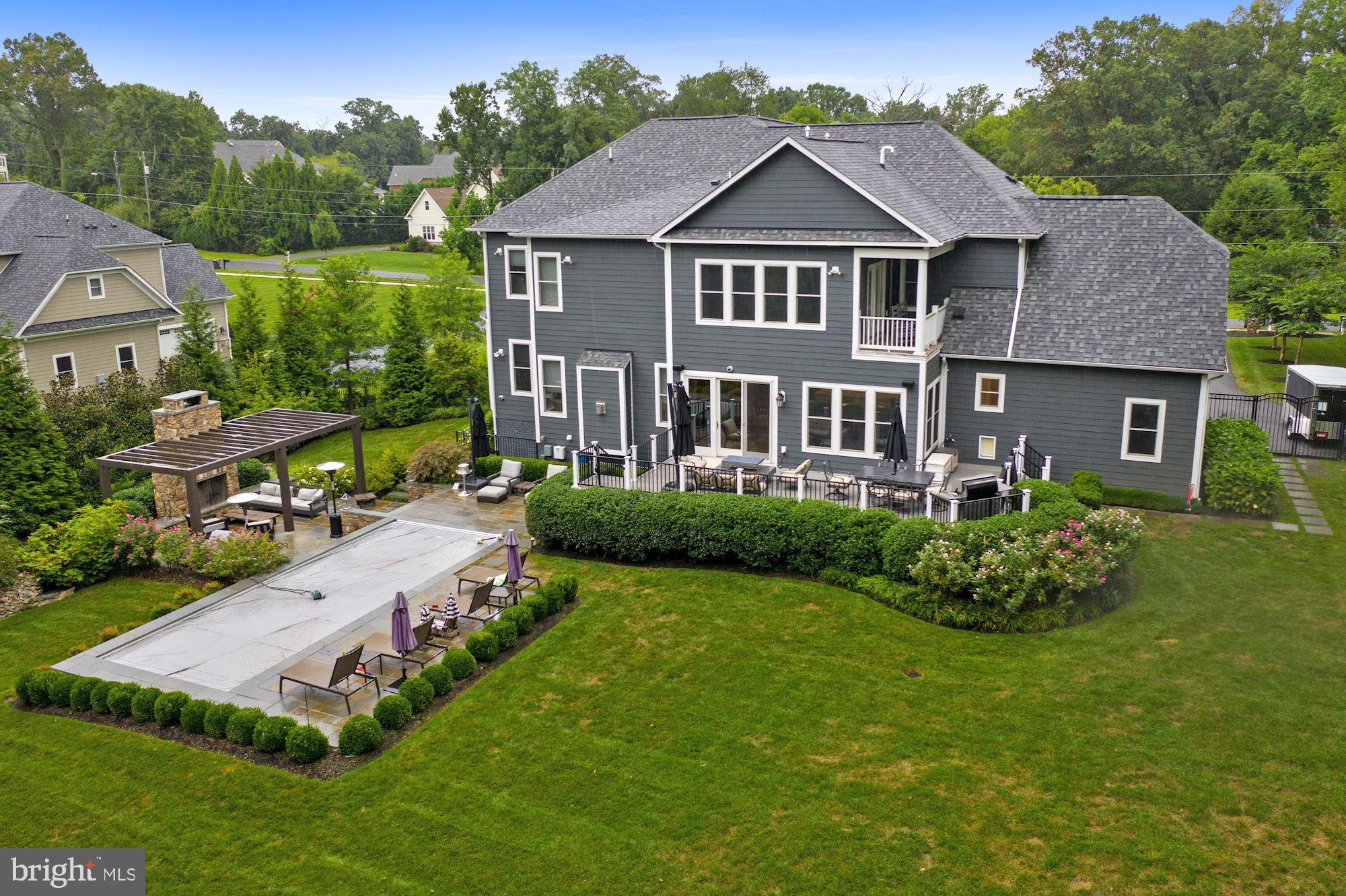 11645 Pine Tree Drive Fairfax, VA 22033 - Photo 47 of 48 a front view of a house with a garden