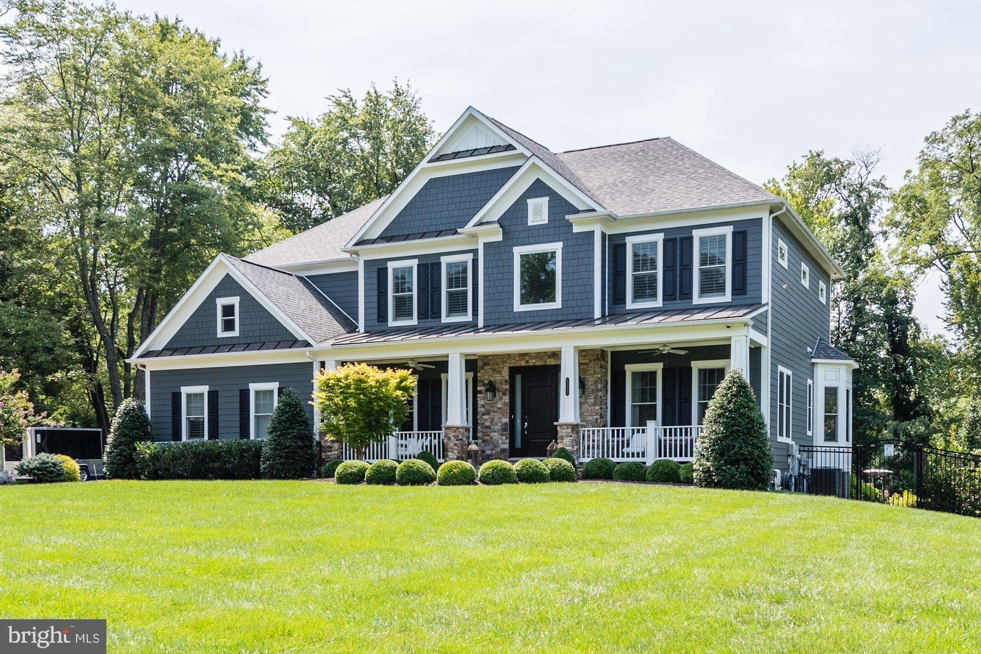 11645 Pine Tree Drive Fairfax, VA 22033 - Photo 48 of 48 a front view of a house with a yard