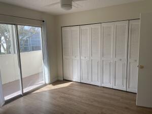 105 Mansfield F, Unit C Boca Raton, FL 33434 - Photo 7 of 14 a view of a small space with wooden floor