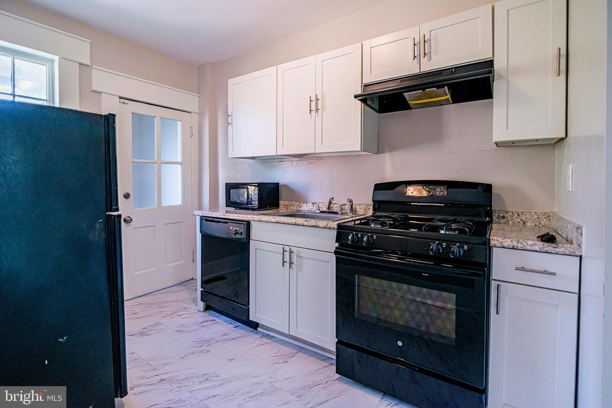 6830 Dunbar Road Baltimore, MD 21222 - Photo 4 of 30 Updated kitchen with low maintenance appliances