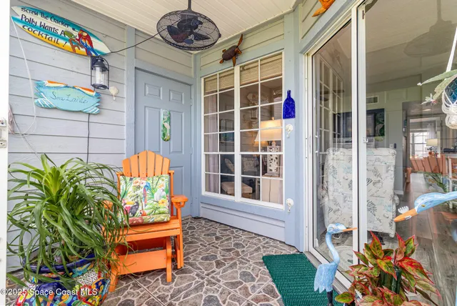 a view of a city from a dinning room with furniture