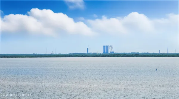 a view of a balcony with an outdoor space