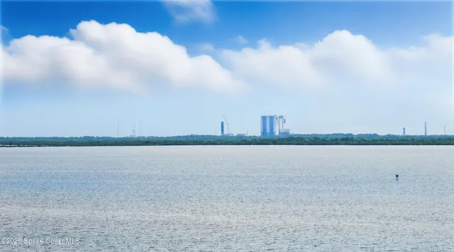 a view of a balcony with an outdoor space
