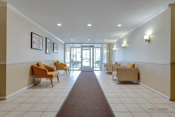 a lobby with furniture and a couch