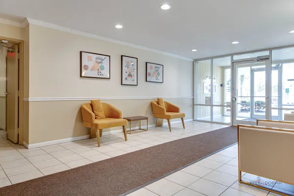 a living room with furniture and a couch