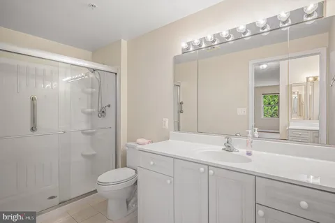 a view of an empty room and wooden floor