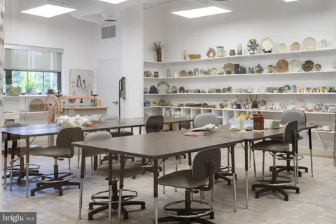 a view of a large window with an outdoor seating