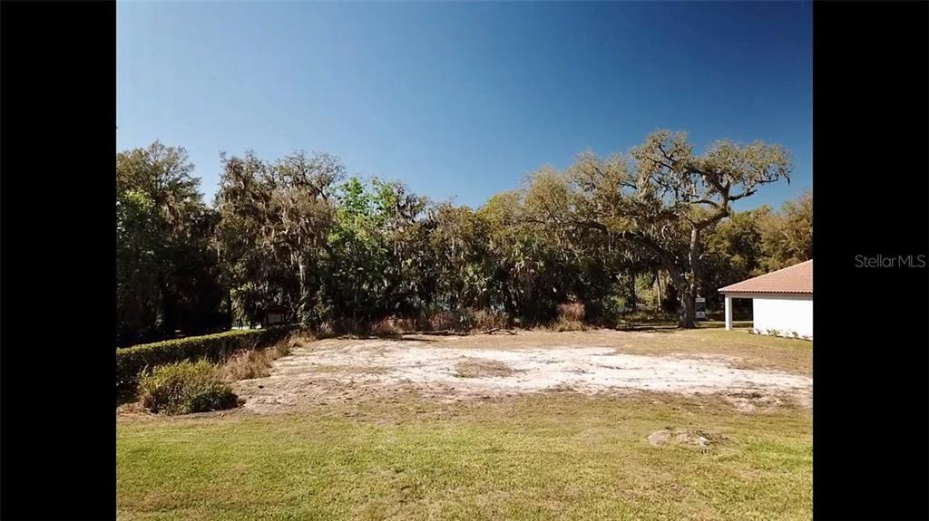 122 Rosa Bella View DeBary, FL 32713 - Photo 5 of 10 a view of back yard of the house