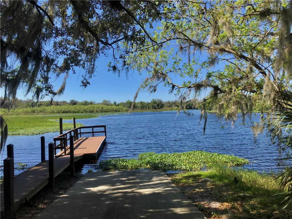 122 Rosa Bella View DeBary, FL 32713 - Photo 10 of 10 a view of a wooden deck with a yard