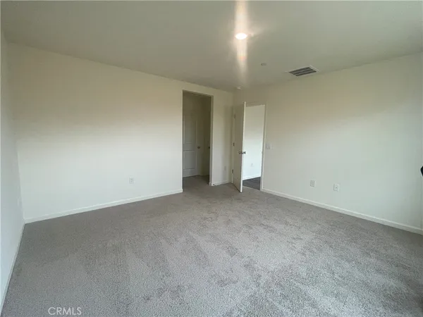 an empty room with an entryway