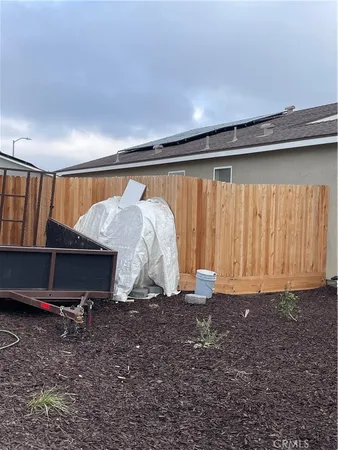a view of a fireplace with cars on city street