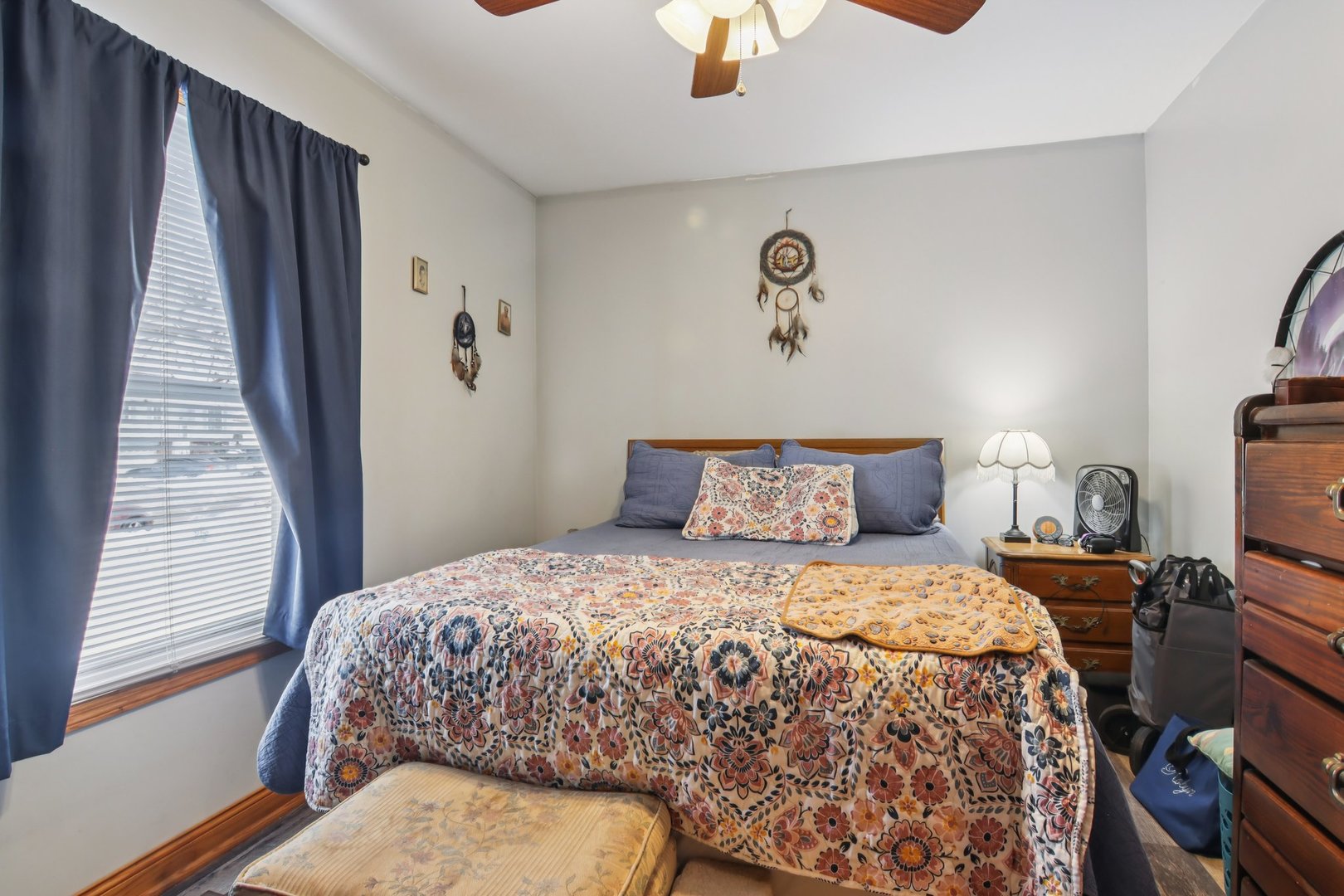 327 Hickory Avenue Romeoville, IL 60446 - Photo 18 of 33 a bedroom with a bed and a chandelier