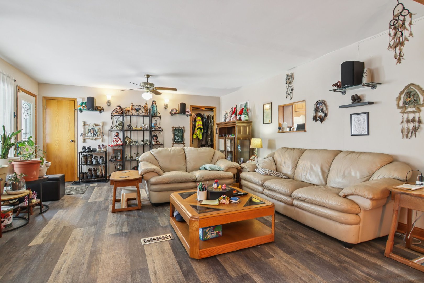 327 Hickory Avenue Romeoville, IL 60446 - Photo 9 of 33 a living room with furniture and a wooden floor