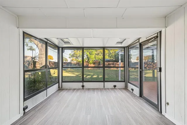 a view of backyard with green space