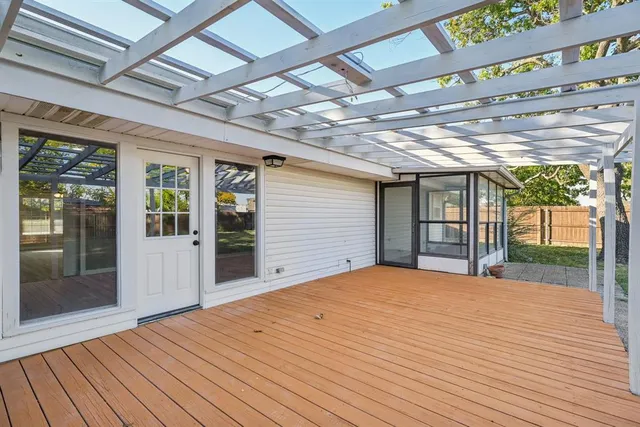 a view of a yard with a house and a garden