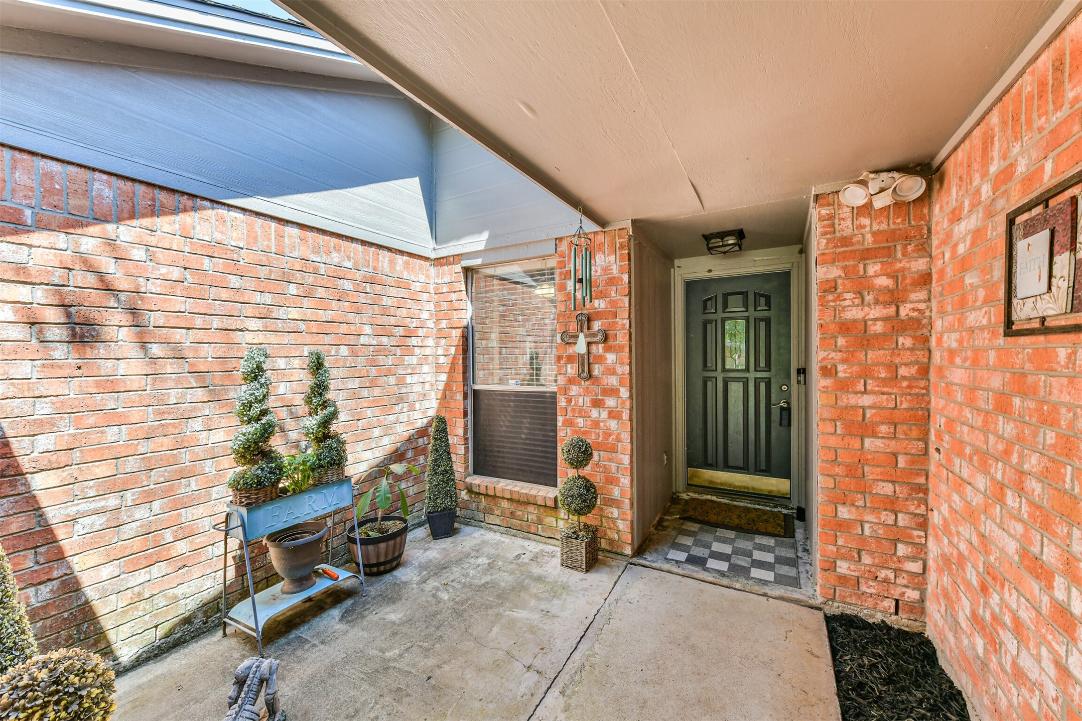 15105 Silverman Street Houston, TX 77598 - Photo 3 of 26 The covered front porch offers ample width, perfect for showcasing your favorite plants.