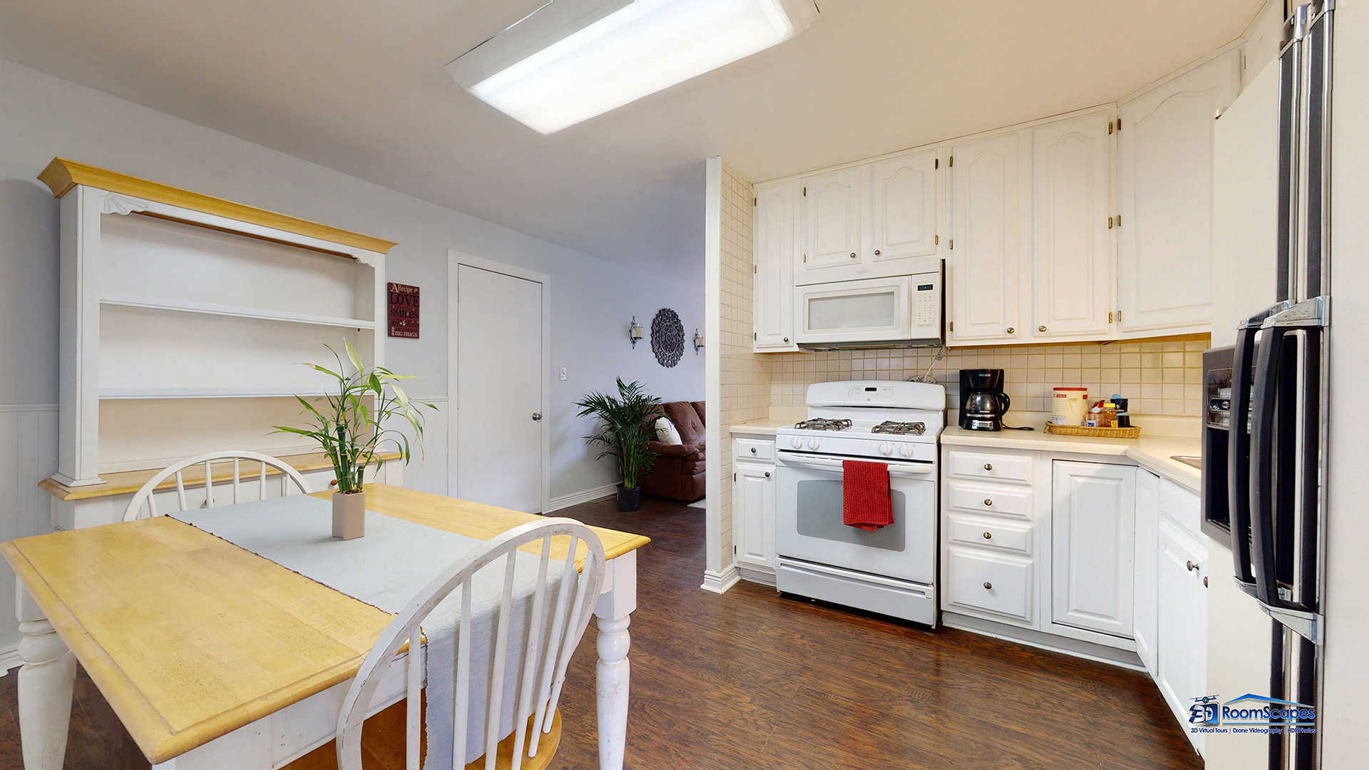 420 Raupp Boulevard Buffalo Grove, IL 60089 - Photo 10 of 41 a kitchen with stainless steel appliances a stove a sink and white cabinets