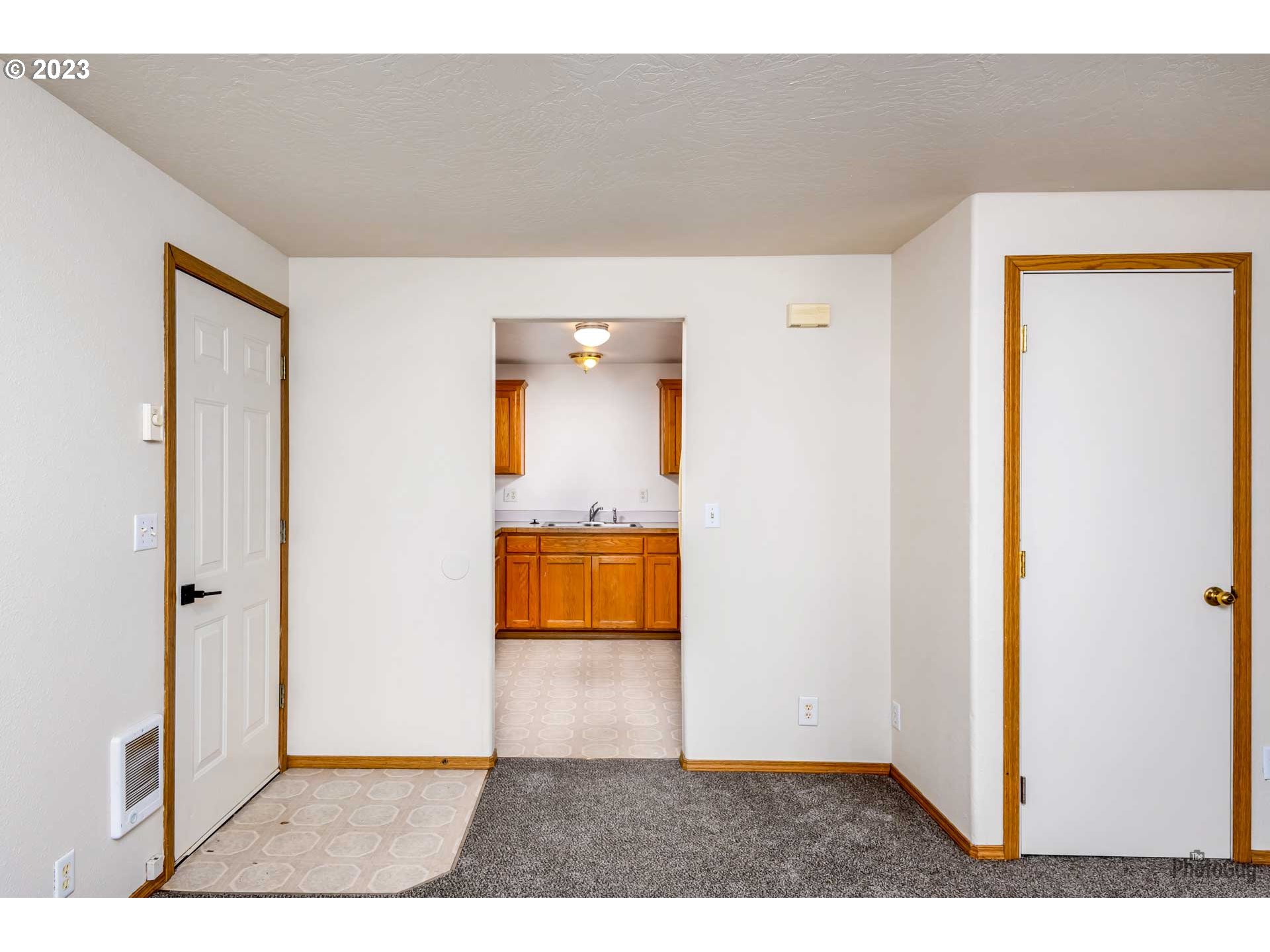 499 South 41st Street Springfield, OR 97478 - Photo 15 of 26 a view interior of a house an empty room and wooden floor