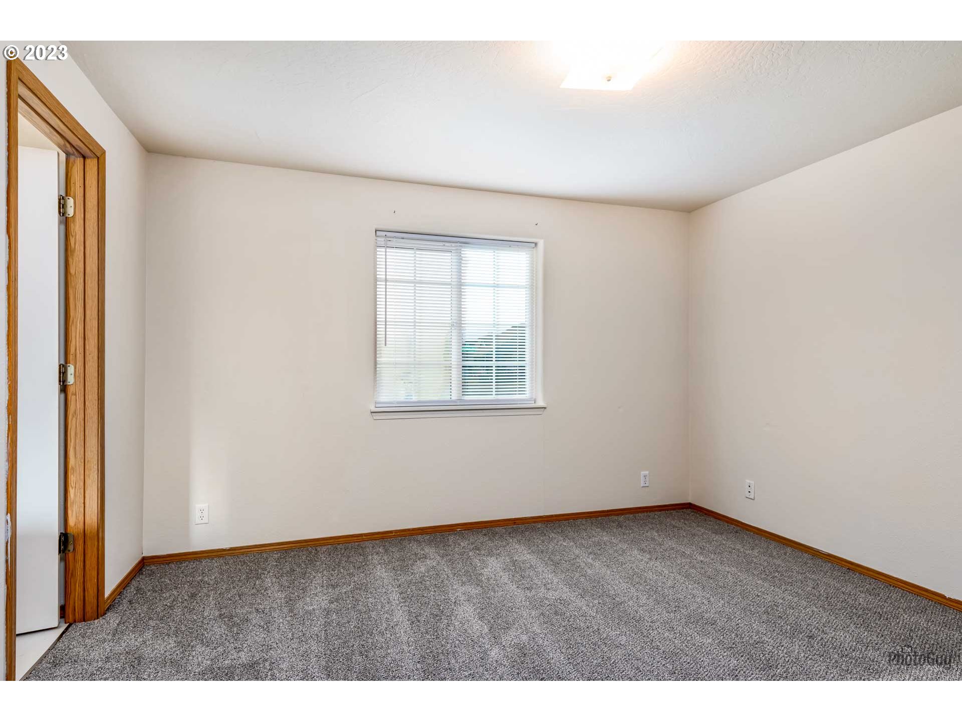 499 South 41st Street Springfield, OR 97478 - Photo 17 of 26 a view of an empty room with a window