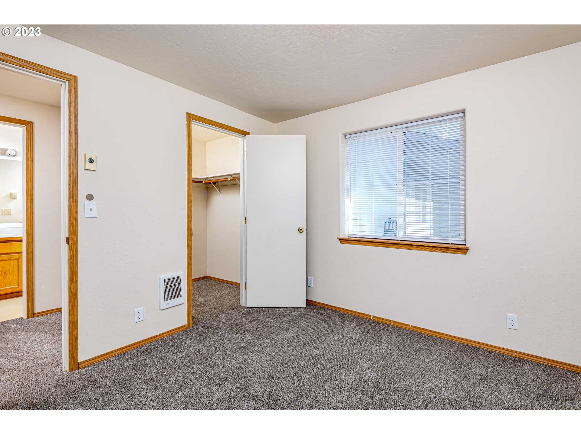 499 South 41st Street Springfield, OR 97478 - Photo 25 of 26 a view of an empty room with closet and a window