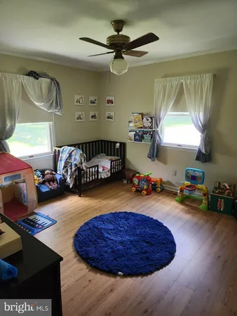 a room with furniture and a window
