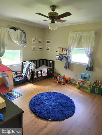 a room with furniture and a window