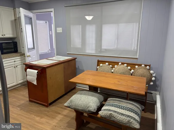 a room with furniture and window