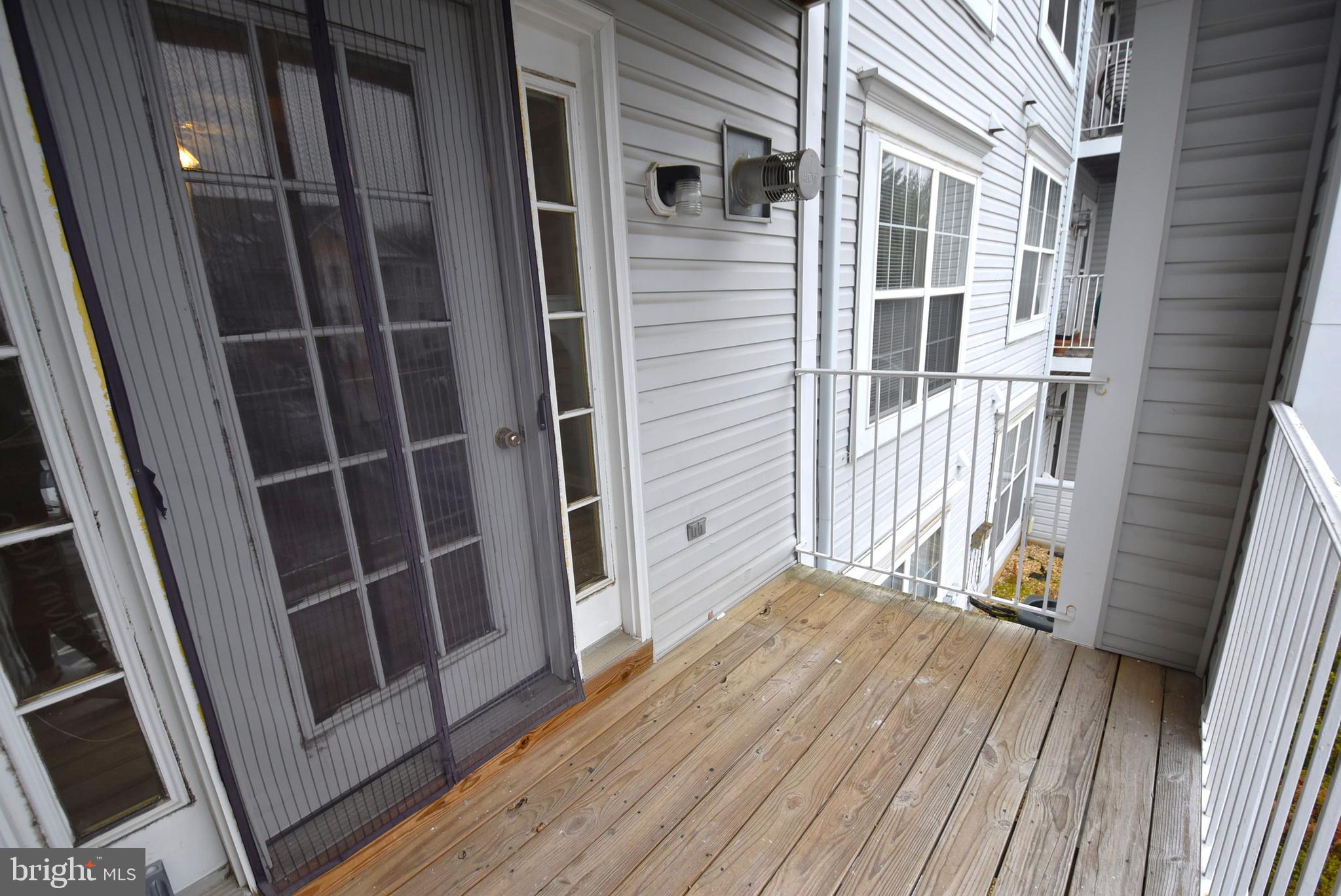2002 Phillips Terrace, Unit 6 Annapolis, MD 21401 - Photo 16 of 17 a view of front door deck and floor