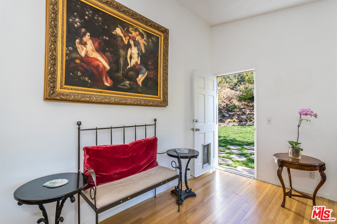 9767 Beth Place Beverly Hills, CA 90210 - Photo 25 of 33 a view of a livingroom with furniture and a potted plant