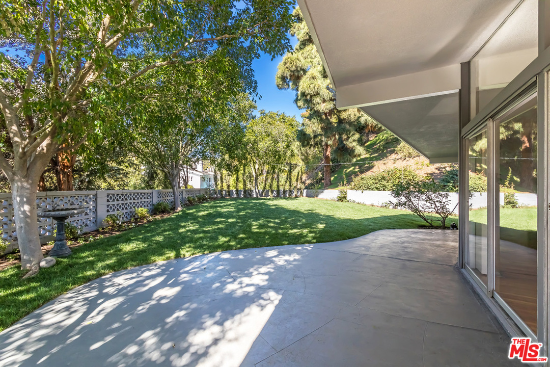 9767 Beth Place Beverly Hills, CA 90210 - Photo 31 of 33 a view of a yard with flower plants
