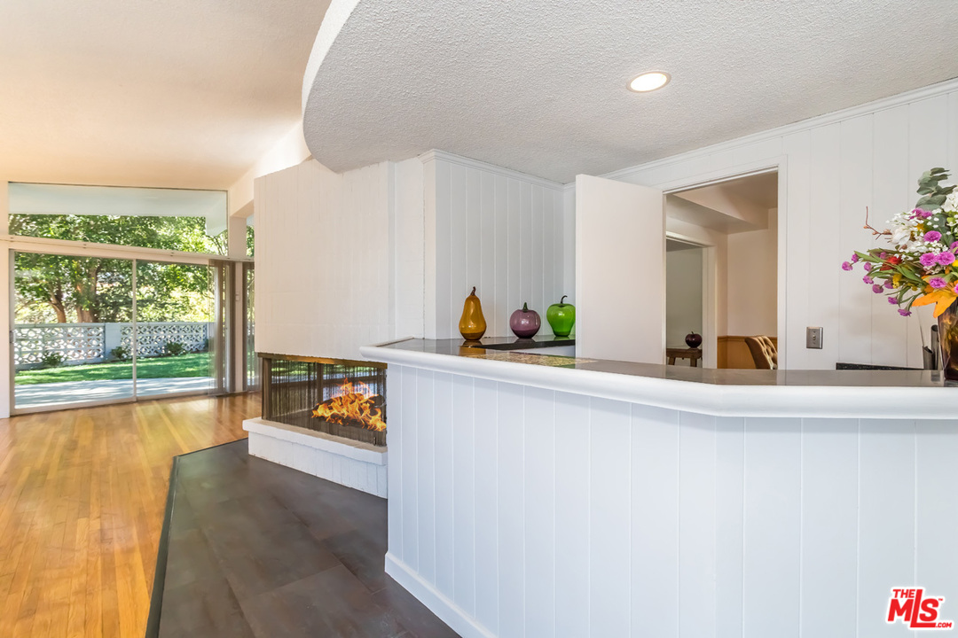 9767 Beth Place Beverly Hills, CA 90210 - Photo 10 of 33 a living room with furniture and a large window