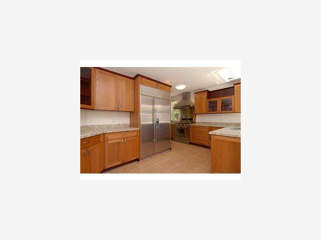 1231 Southdown Road Hillsborough, CA 94010 - Photo 2 of 9 a kitchen with stainless steel appliances a sink and a refrigerator