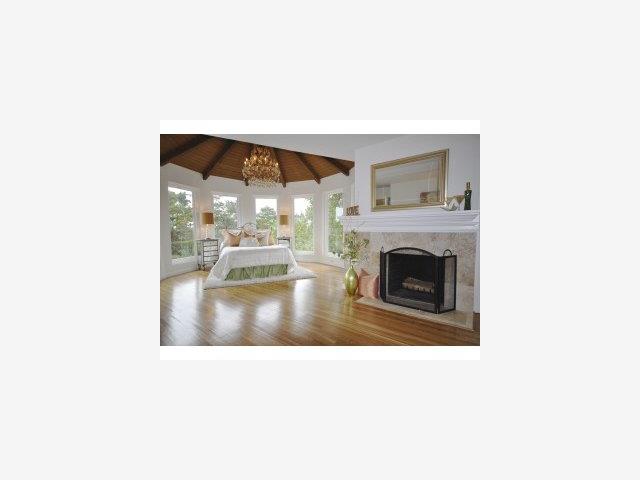 1231 Southdown Road Hillsborough, CA 94010 - Photo 4 of 9 a picture of a living room with a fireplace