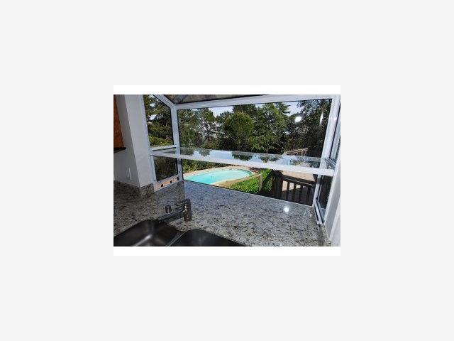 1231 Southdown Road Hillsborough, CA 94010 - Photo 8 of 9 a picture of a living room with a floor to ceiling window and floor