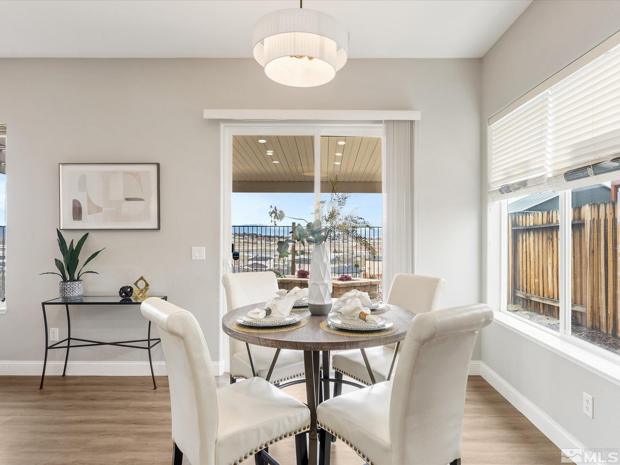 1448 Hagar Road Reno, NV 89506 - Photo 11 of 38 a view of a dining room with furniture window and wooden floor