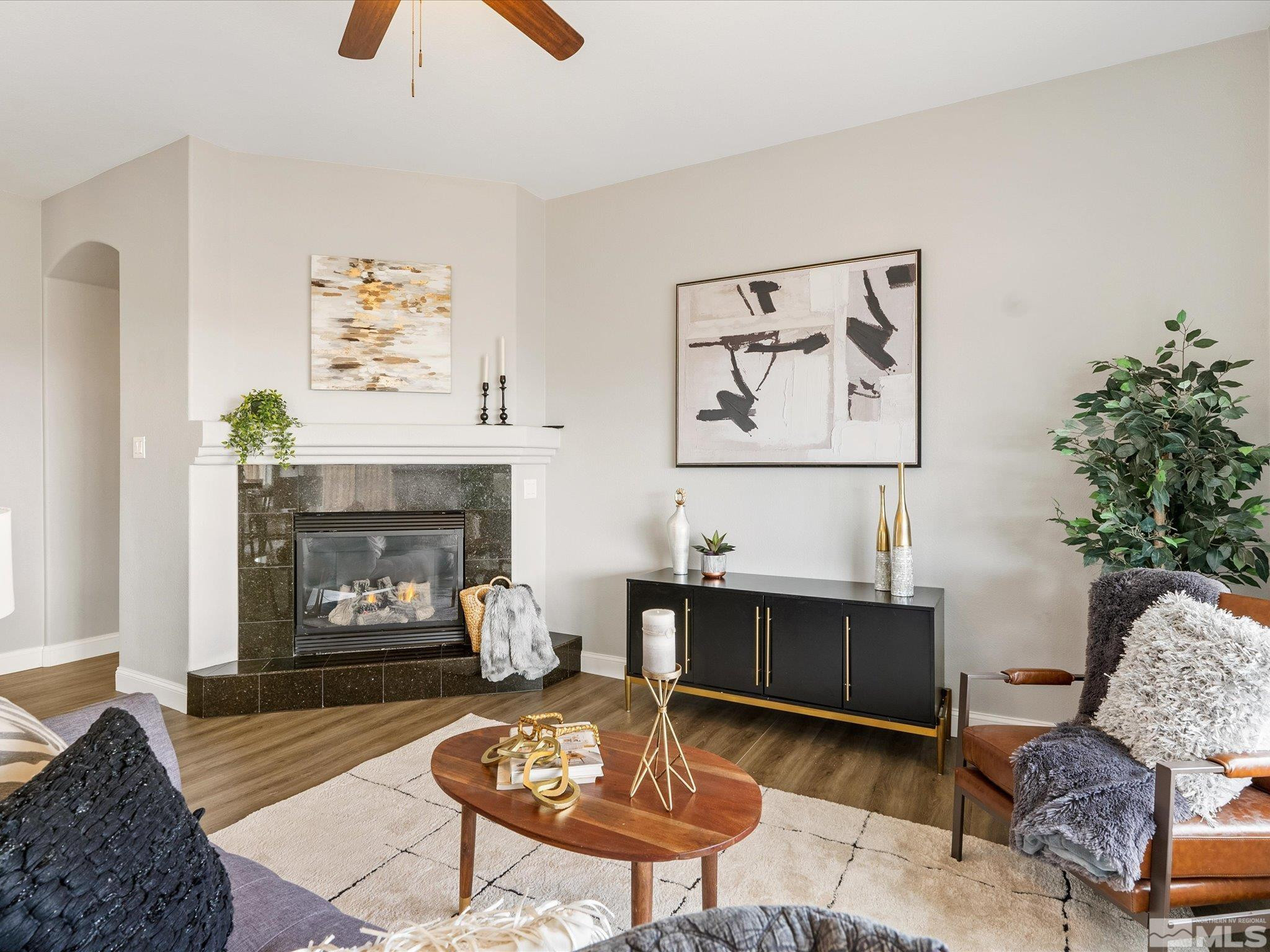 1448 Hagar Road Reno, NV 89506 - Photo 16 of 38 a living room with furniture and a fireplace