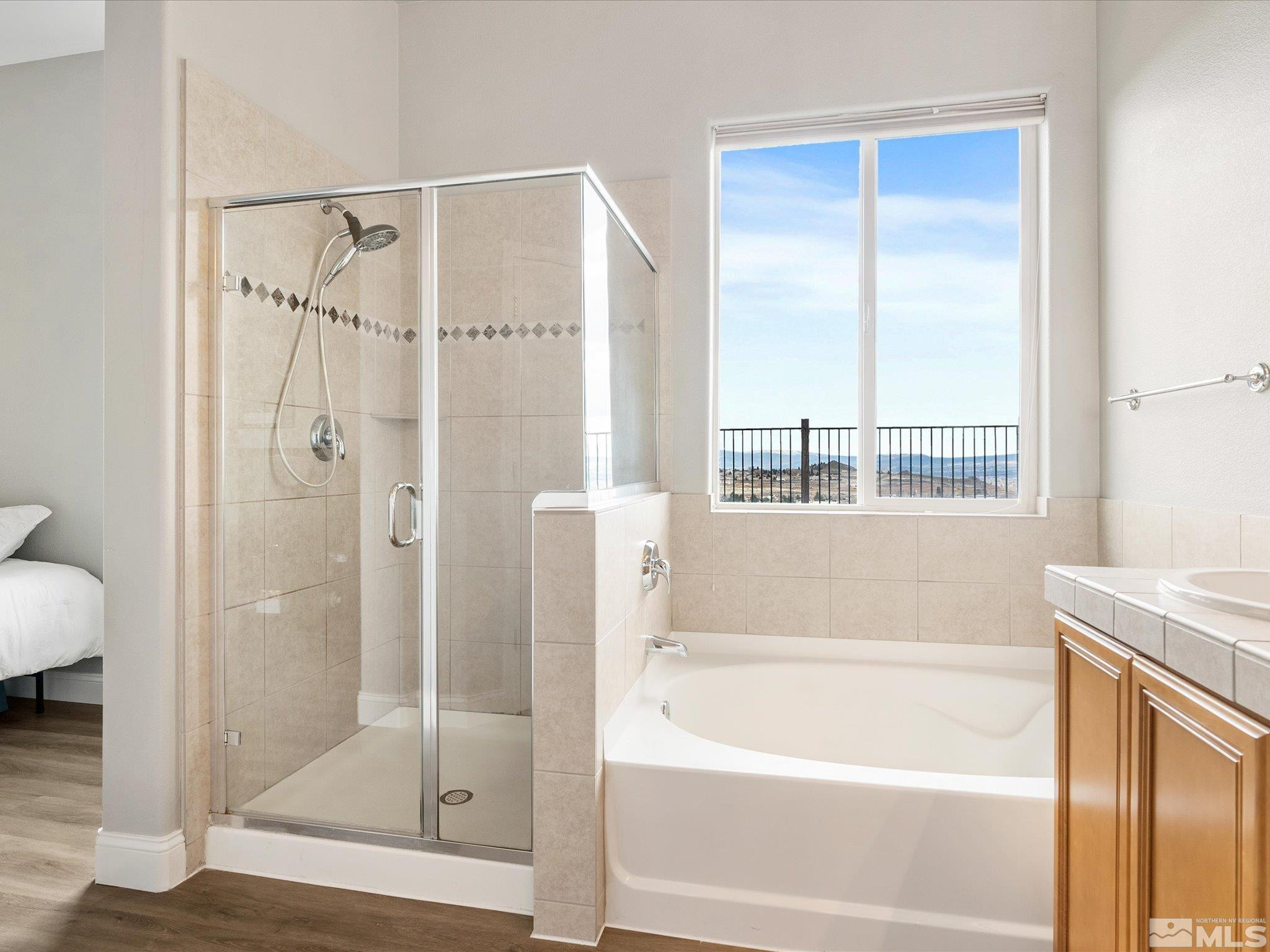 1448 Hagar Road Reno, NV 89506 - Photo 25 of 38 a bathroom with a shower and a bath tub